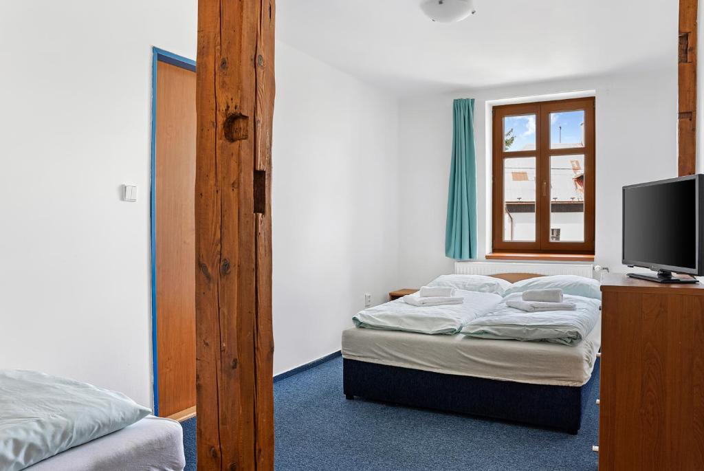Postel nebo postele na pokoji v ubytování Hotel Franz