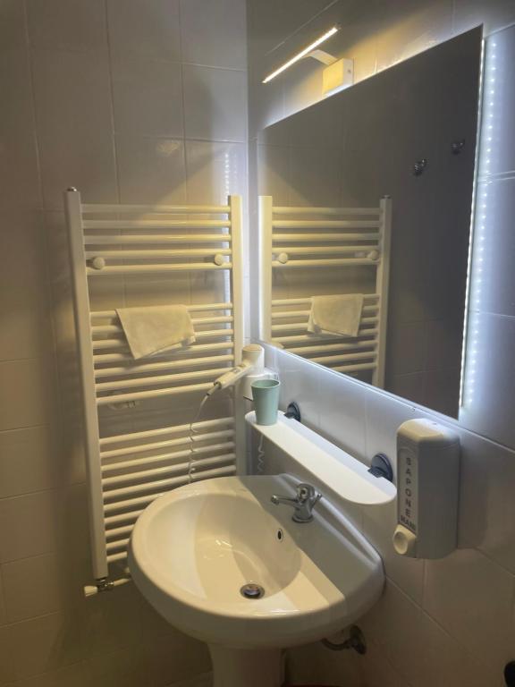Koupelna v ubytování Albergo Roma