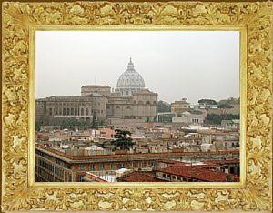 ein gerahmtes Bild einer Stadt mit einem Gebäude in der Unterkunft Terrazza San Pietro in Rom