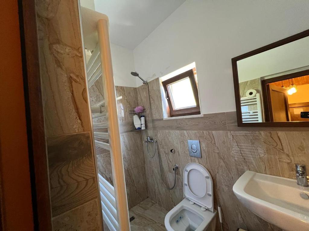 Koupelna v ubytování Guesthouse Gjoni Theth