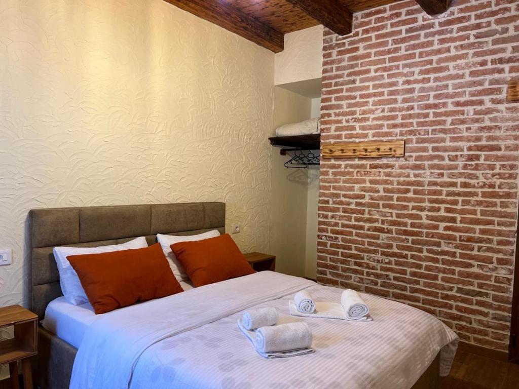 Postel nebo postele na pokoji v ubytování Guesthouse Gjoni Theth