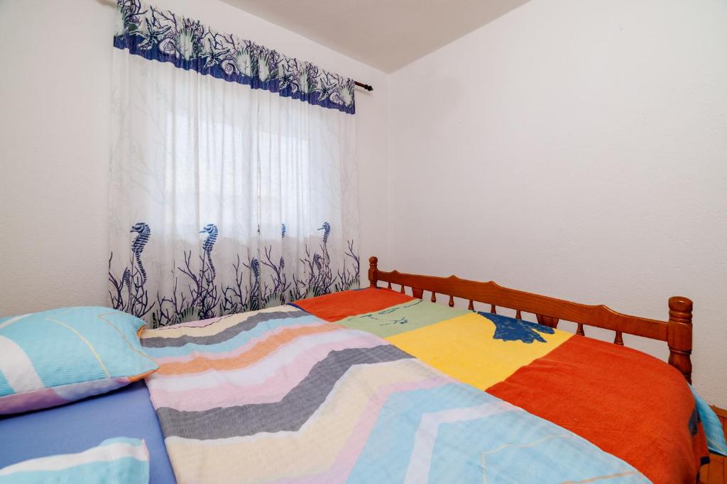 Posteľ alebo postele v izbe v ubytovaní Apartments Zvonimir