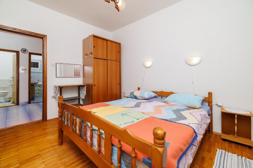 Posteľ alebo postele v izbe v ubytovaní Apartments Zvonimir