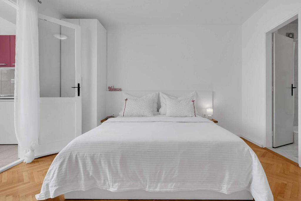 Posteľ alebo postele v izbe v ubytovaní Apartments Ivica