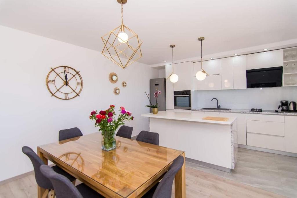 Kuchyňa alebo kuchynka v ubytovaní Apartment Tom