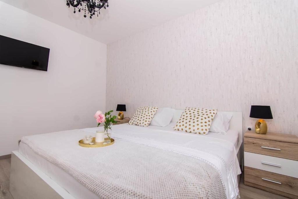 Posteľ alebo postele v izbe v ubytovaní Apartment Tom