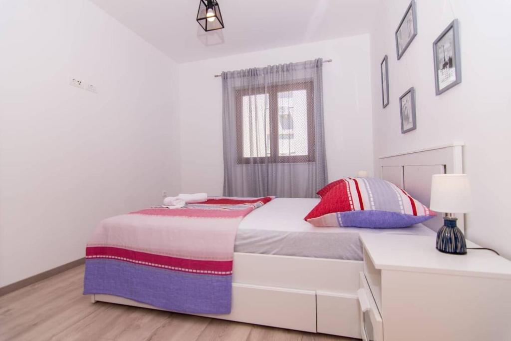 Posteľ alebo postele v izbe v ubytovaní Apartment Tom