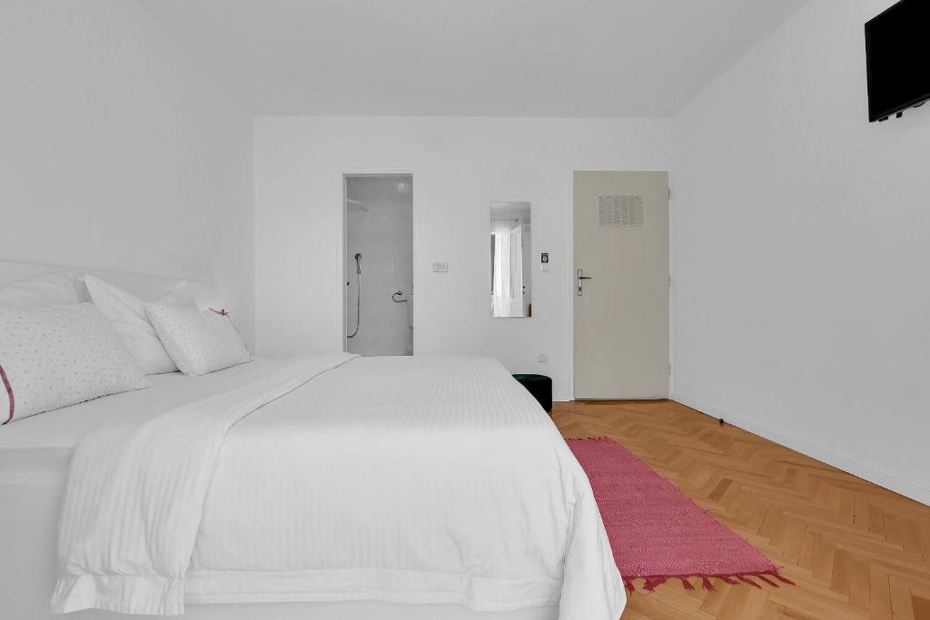 Posteľ alebo postele v izbe v ubytovaní Apartments Ivica