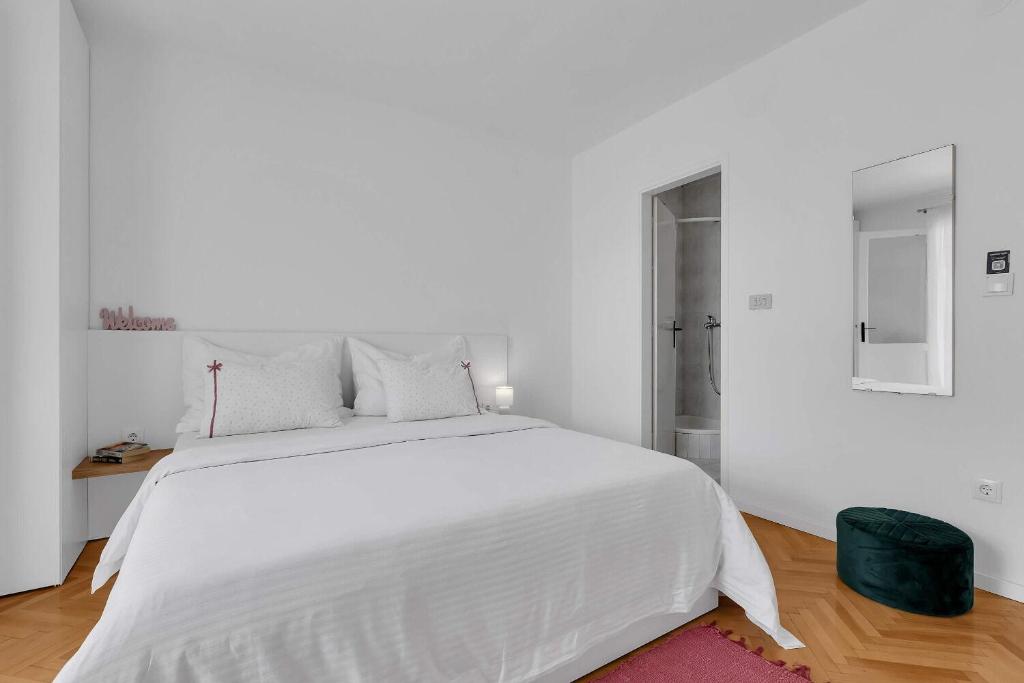 Posteľ alebo postele v izbe v ubytovaní Apartments Ivica