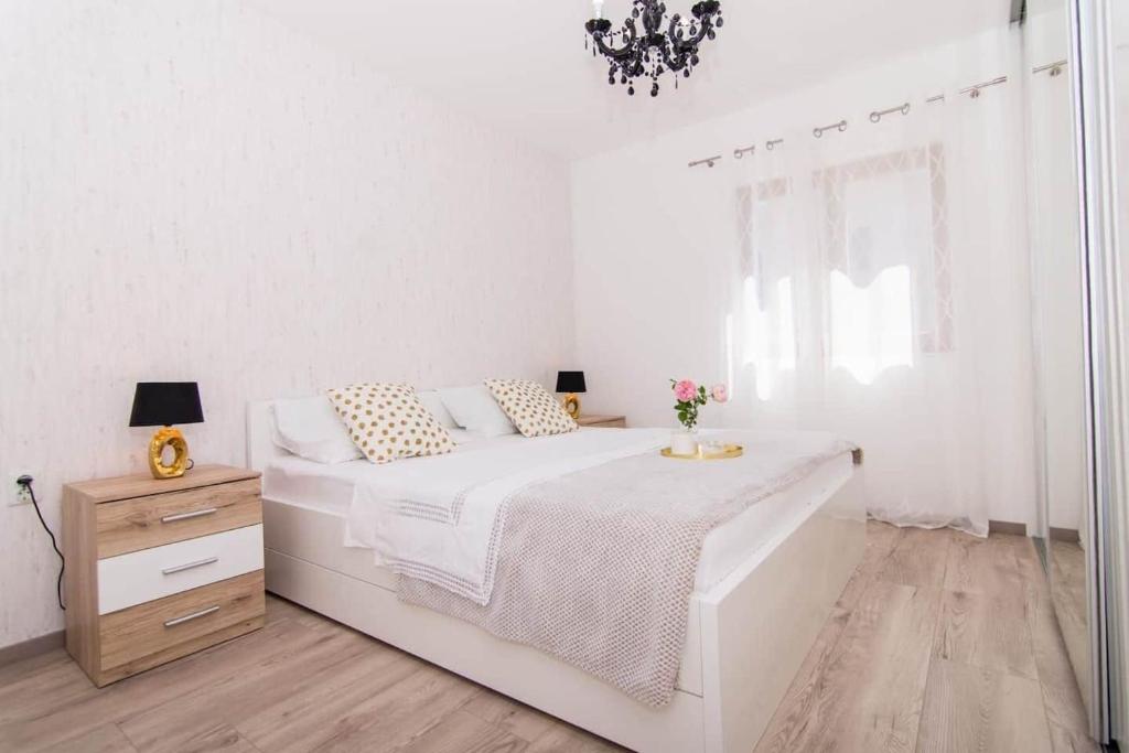 Posteľ alebo postele v izbe v ubytovaní Apartment Tom