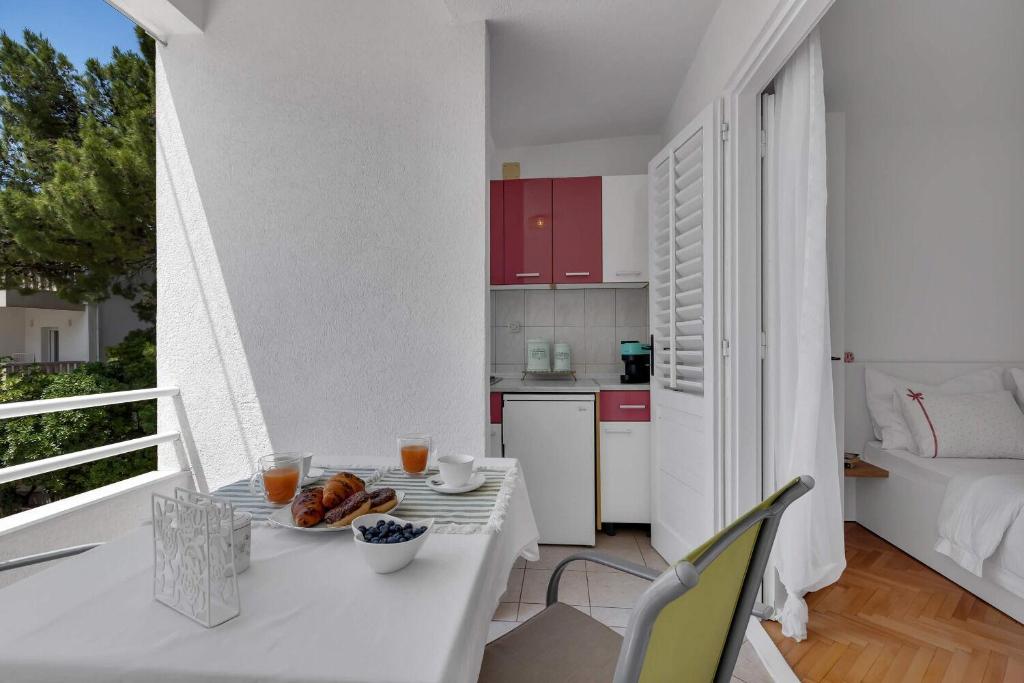 Kuchyňa alebo kuchynka v ubytovaní Apartments Ivica