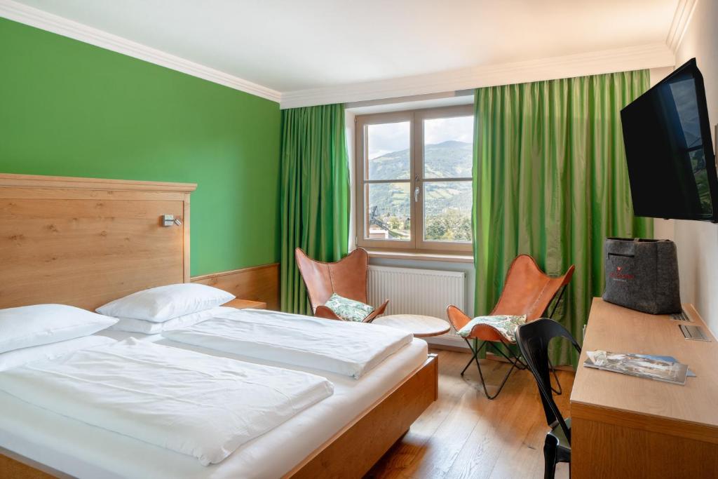 Voodi või voodid majutusasutuse Familotel Amiamo toas