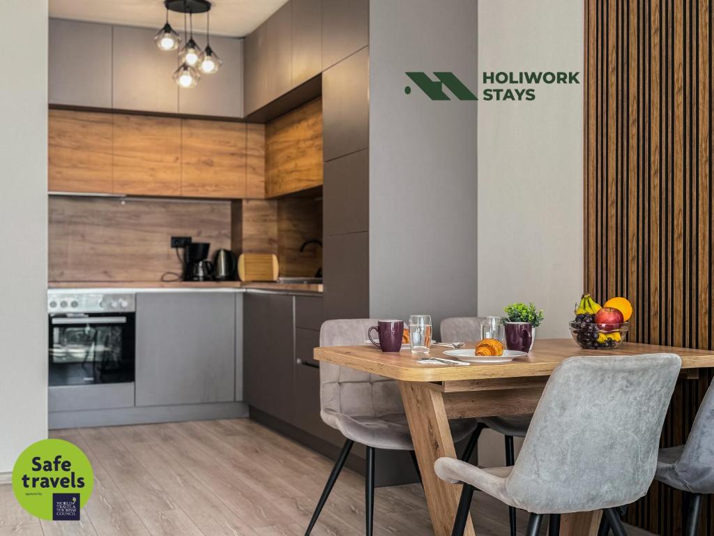 Kuchyň nebo kuchyňský kout v ubytování Modern 1BR Apartment with free Parking and free Gym Pass