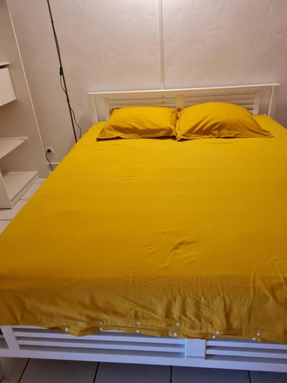 Postel nebo postele na pokoji v ubytování bienvenue a la maison