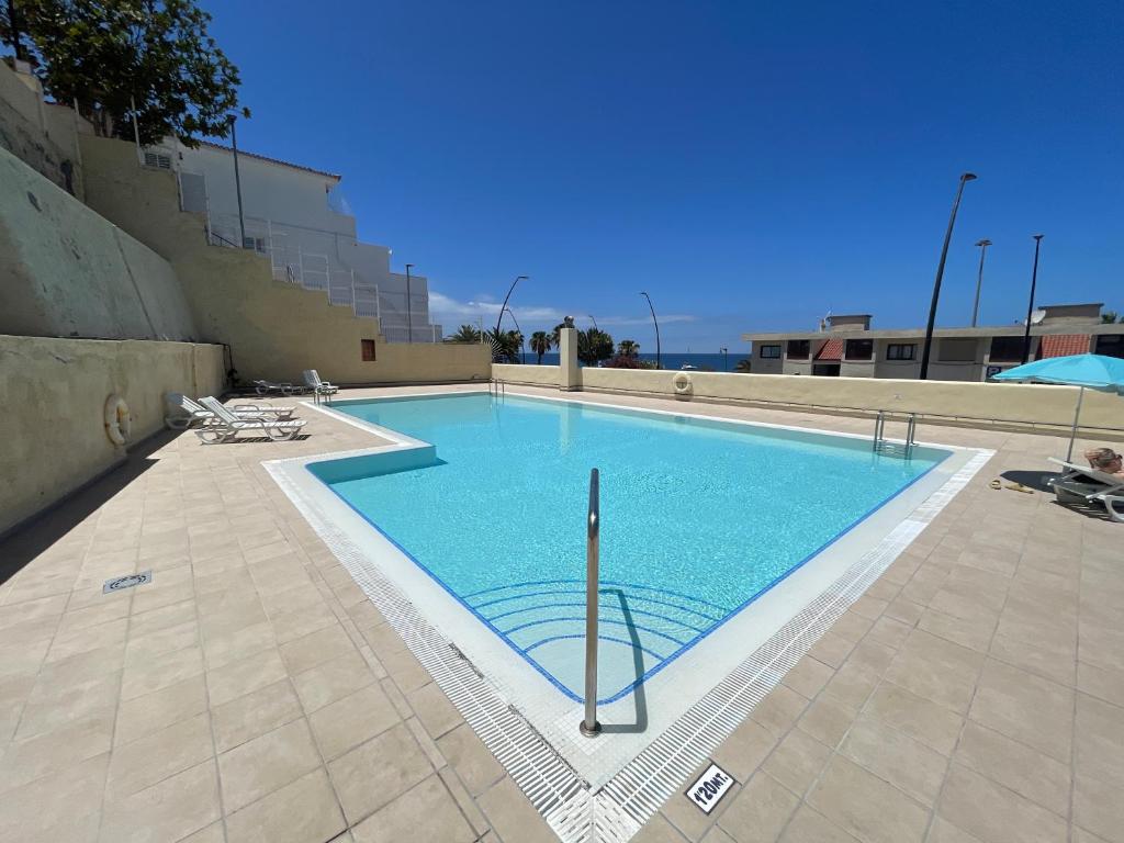 Bazén v ubytování Apartamento Playa vistas 2 nebo v jeho okolí