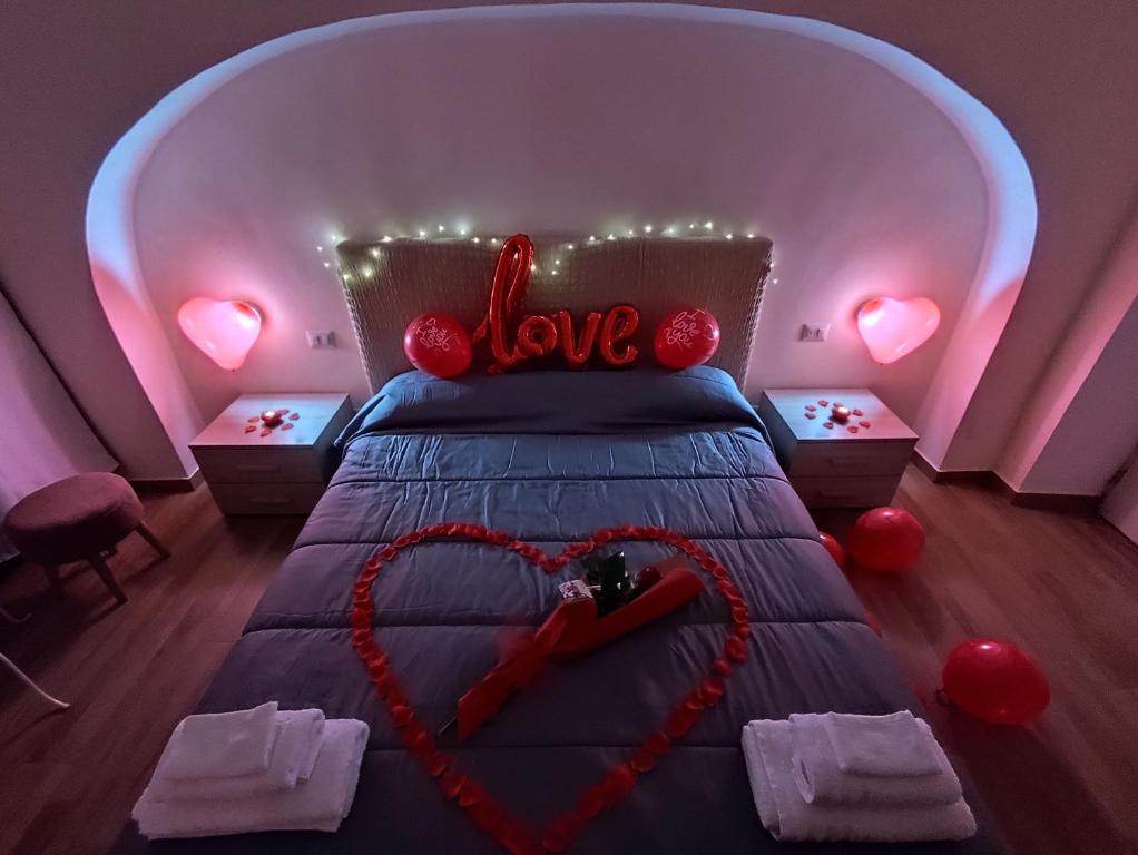 A bed or beds in a room at Affittacamere Silvagni