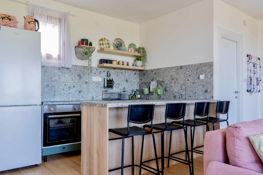 Kuchyň nebo kuchyňský kout v ubytování Rent a NEST