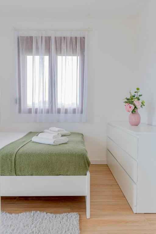 Postel nebo postele na pokoji v ubytování Rent a NEST