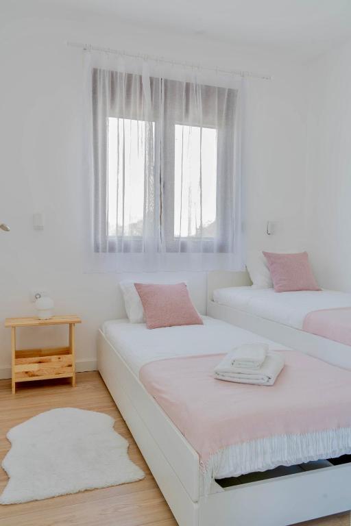 Postel nebo postele na pokoji v ubytování Rent a NEST