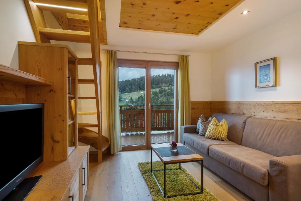 A seating area at Thalerhof Appartement Katrin