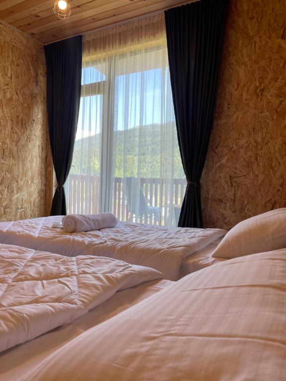 Postel nebo postele na pokoji v ubytování Eco Garden Svaneti