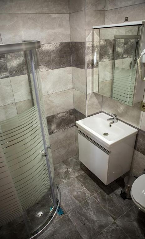 Koupelna v ubytování Aliento Hotel