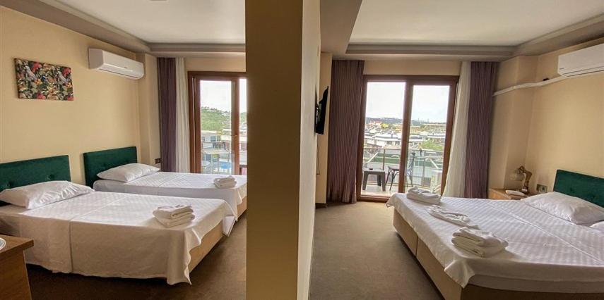 Postel nebo postele na pokoji v ubytování Aliento Hotel