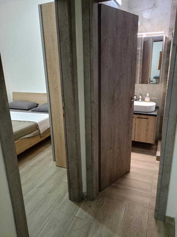 Posteľ alebo postele v izbe v ubytovaní Athens Center Cosy Apartment