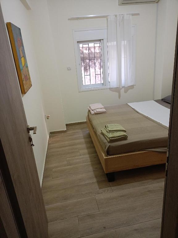 Posteľ alebo postele v izbe v ubytovaní Athens Center Cosy Apartment