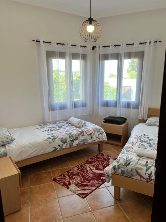 Postel nebo postele na pokoji v ubytování Appart magnifique Cabo Negro