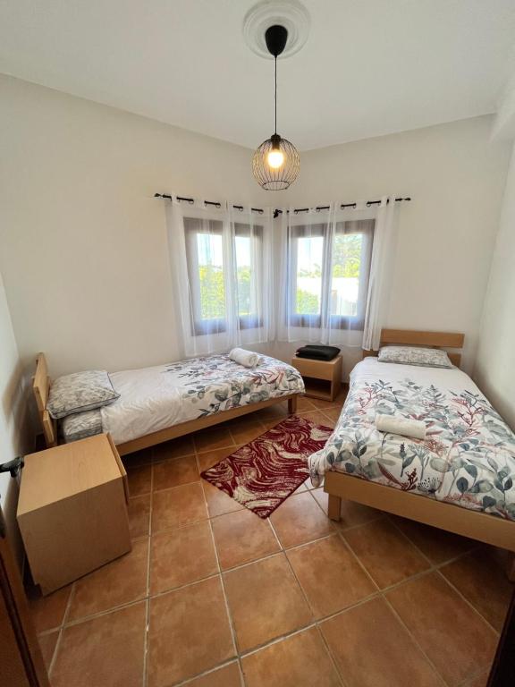 Postel nebo postele na pokoji v ubytování Appart magnifique Cabo Negro