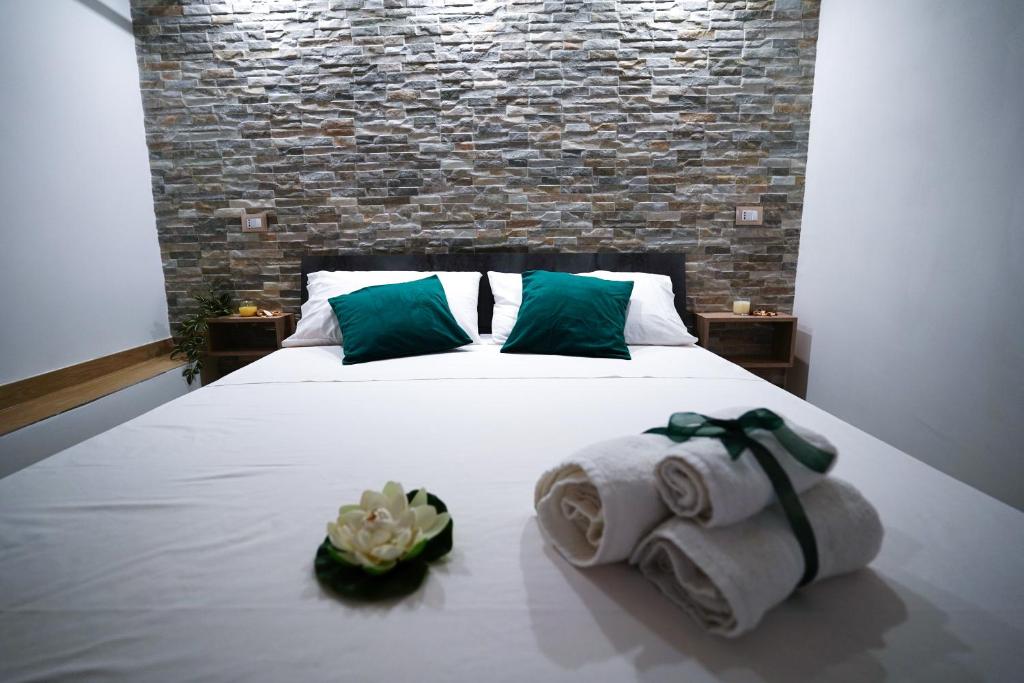 Postel nebo postele na pokoji v ubytování Cori ri Palermo