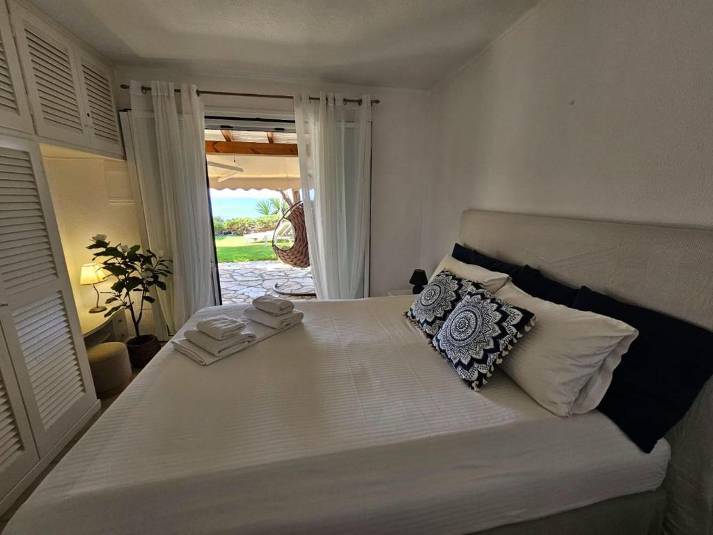 Postel nebo postele na pokoji v ubytování Corfu Dream Holidays Villas