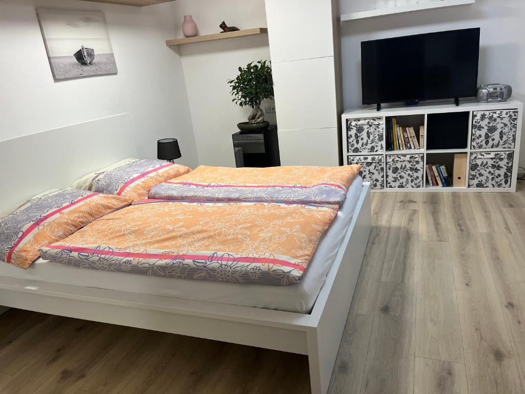 Postel nebo postele na pokoji v ubytování Relax pobyt na břehu Sázavy a na dosah Prahy