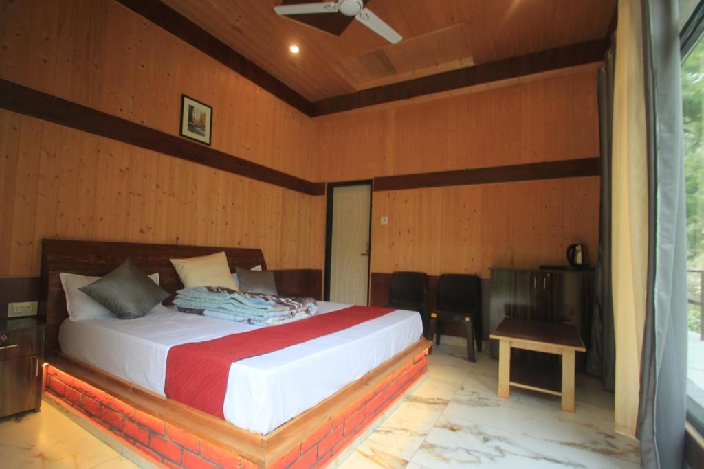 Postel nebo postele na pokoji v ubytování Sukoon Resort