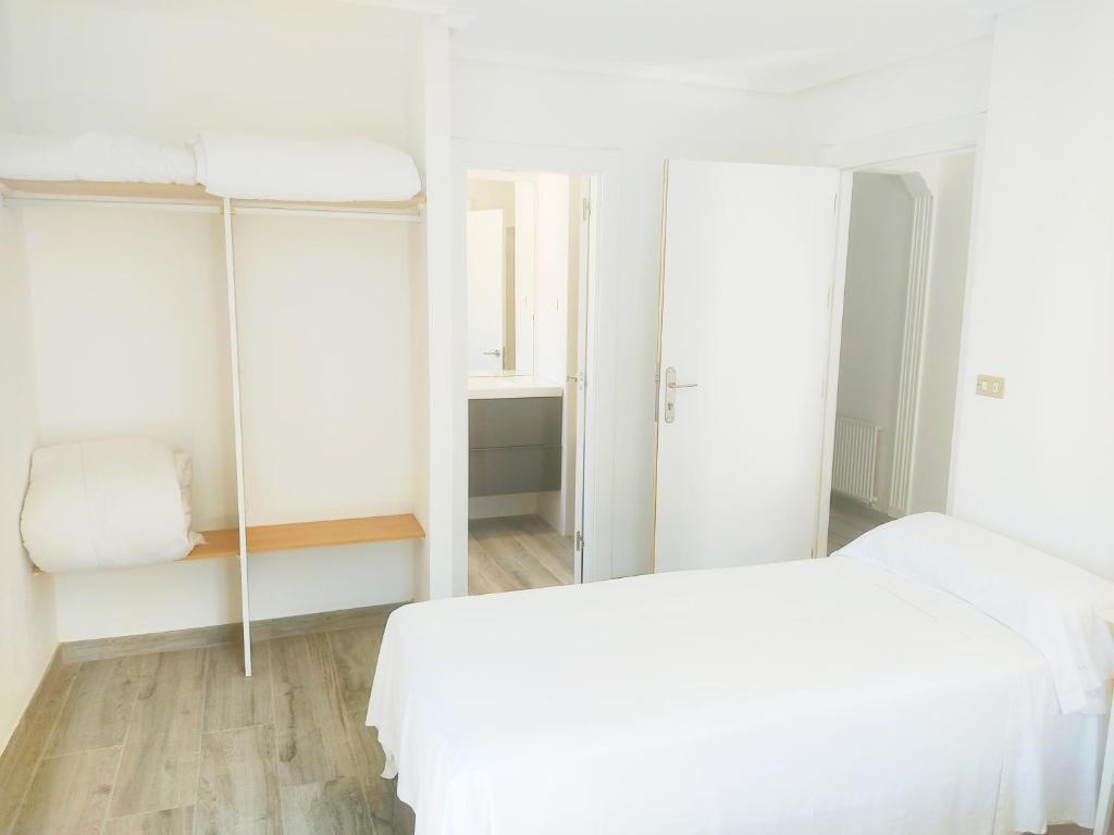 Postel nebo postele na pokoji v ubytování Hotel Lauxeta Berria