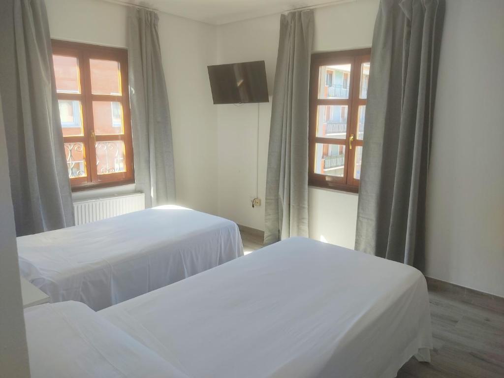 Postel nebo postele na pokoji v ubytování Hotel Lauxeta Berria
