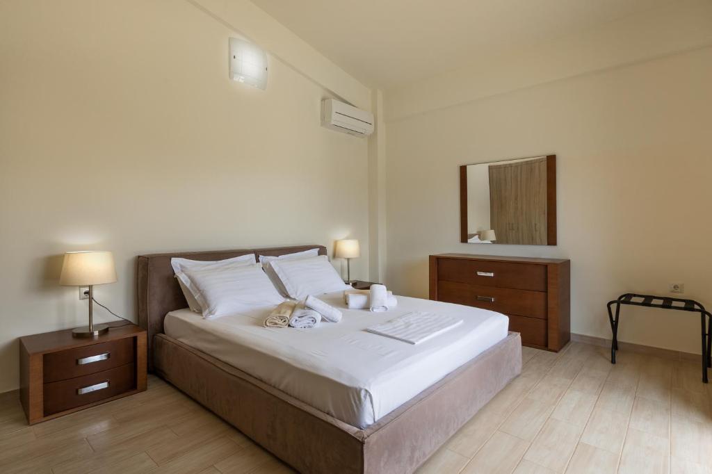 A bed or beds in a room at Nema Villa