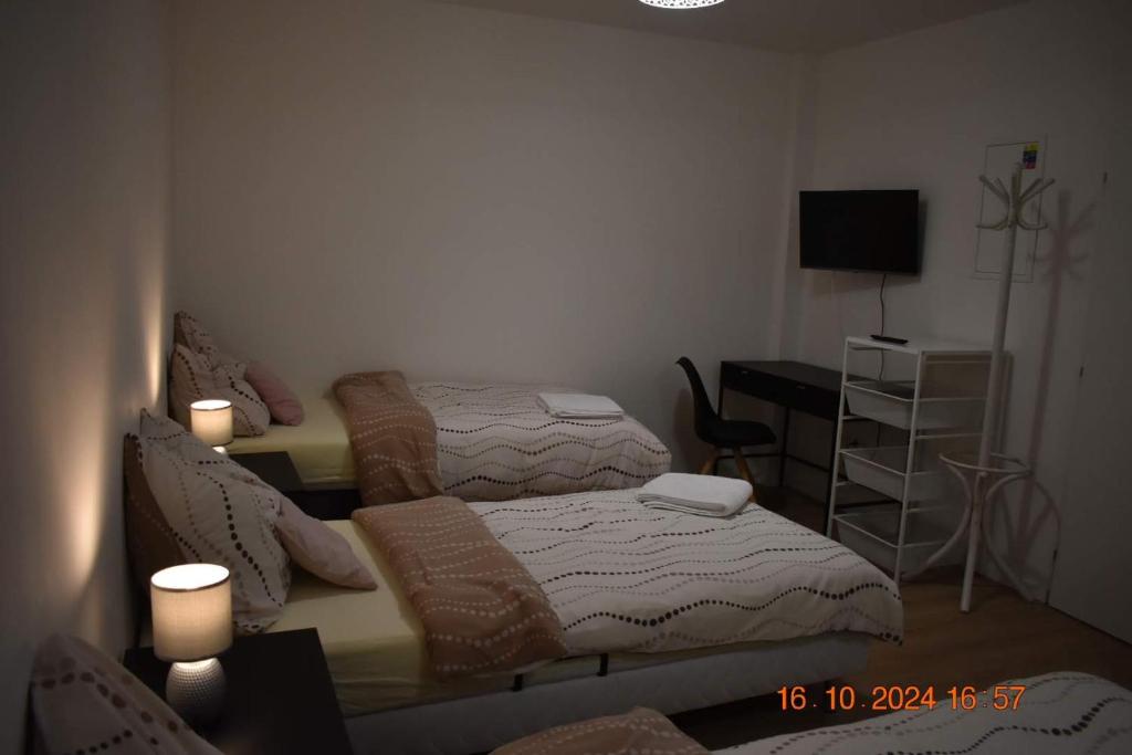 Letto o letti in una camera di Flynnhouse