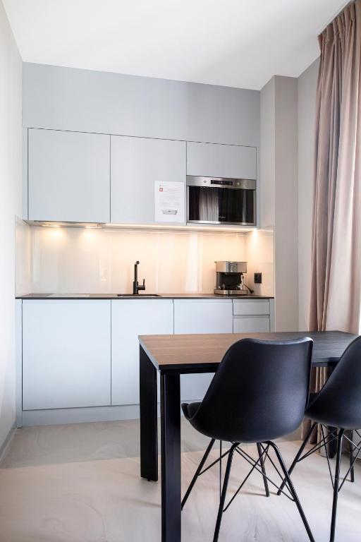 VISIONAPARTMENTS Lugano - contactless check-in - Resim 21