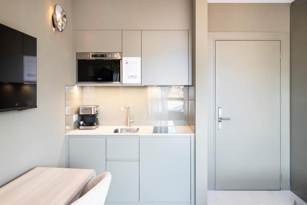 VISIONAPARTMENTS Lugano - contactless check-in - Resim 27