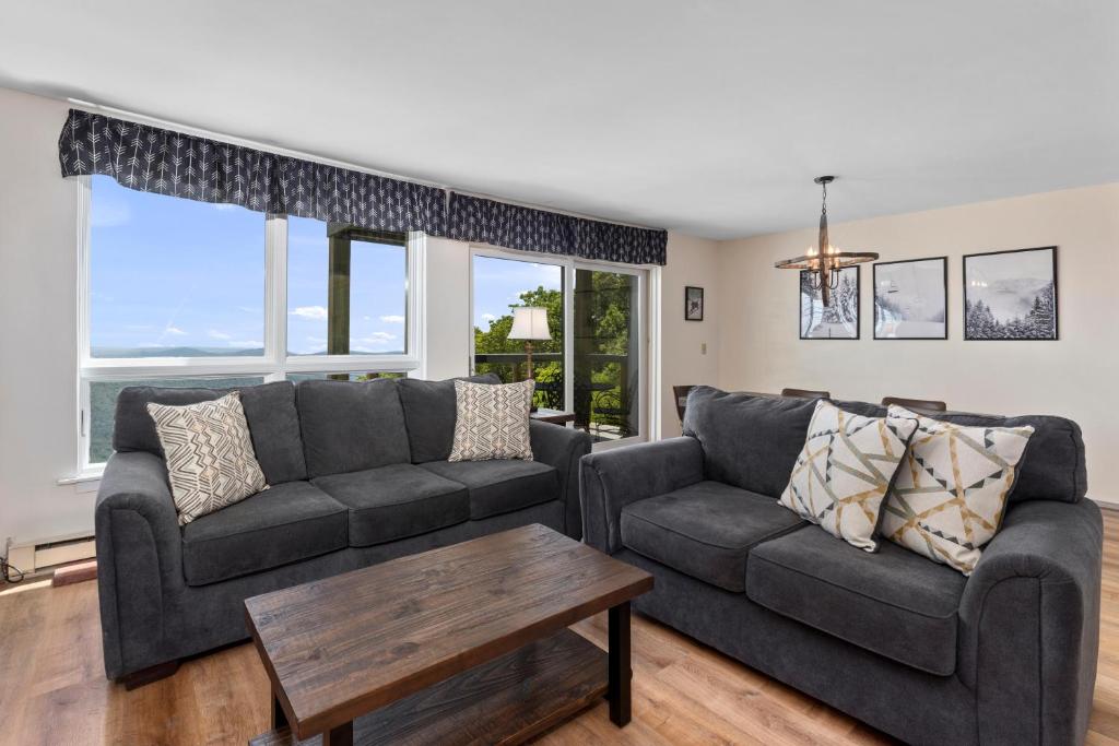 a living room with a couch and a table at Highlands 05 with Wintergreen Advantage in Wintergreen