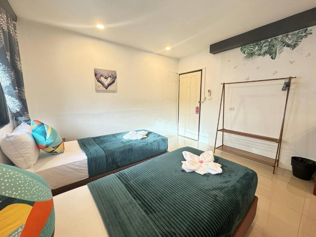 Postel nebo postele na pokoji v ubytování Pupa Rooms