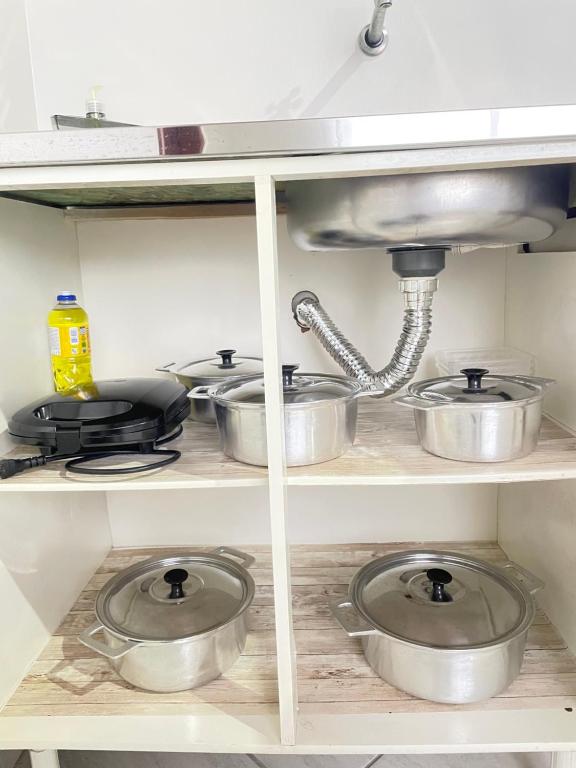 Η κουζίνα ή μικρή κουζίνα στο Kitnet Espaço Aconchego