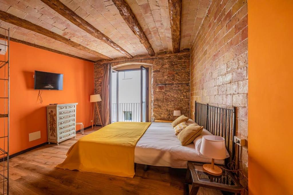 Ένα ή περισσότερα κρεβάτια σε δωμάτιο στο St Domènec apartment