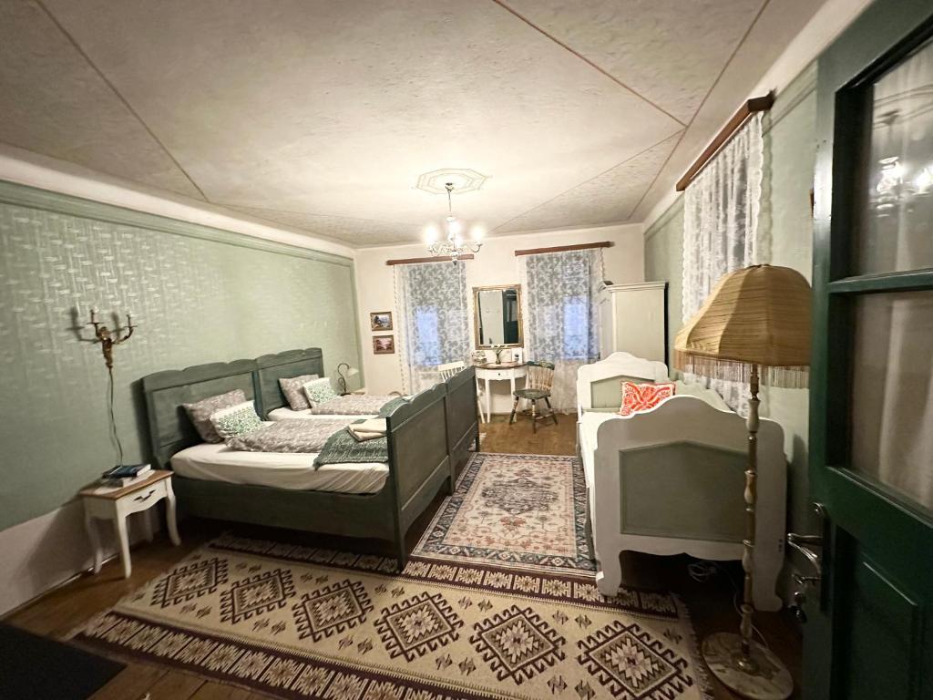Postel nebo postele na pokoji v ubytování Saschiz 130/Lodging and Glamping