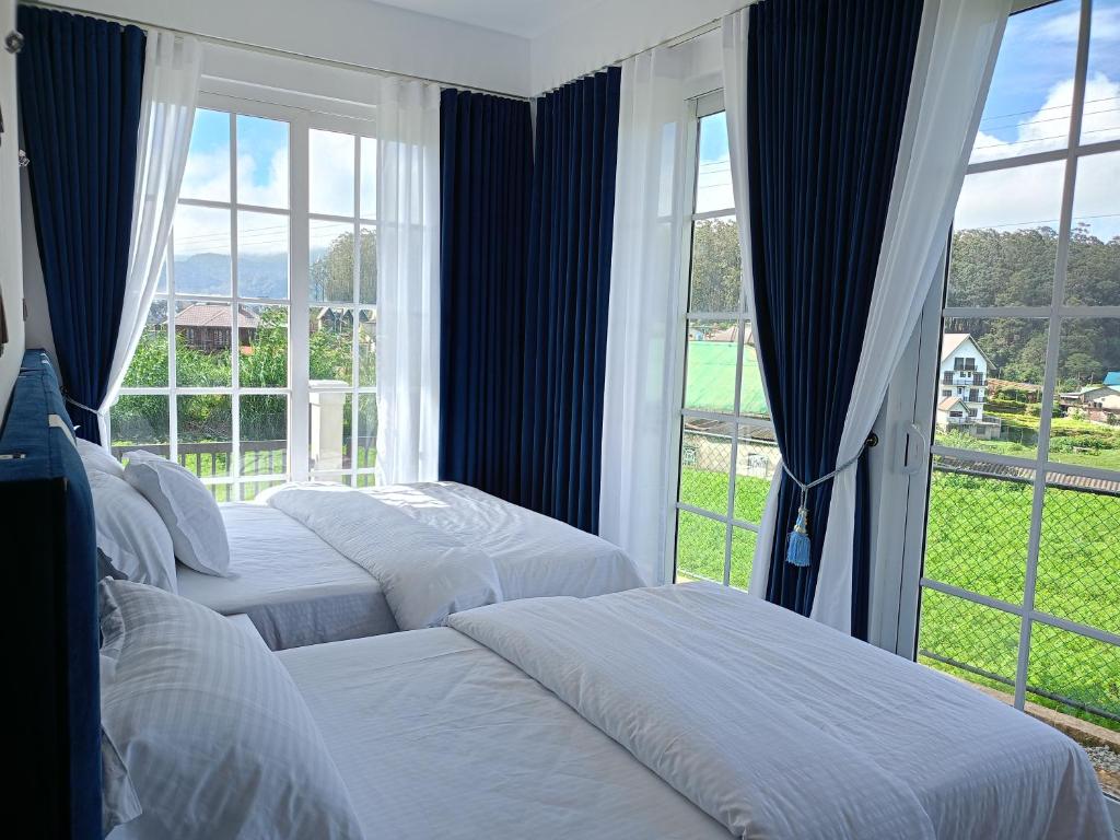 En eller flere senge i et værelse på Golden Mist NuwaraEliya
