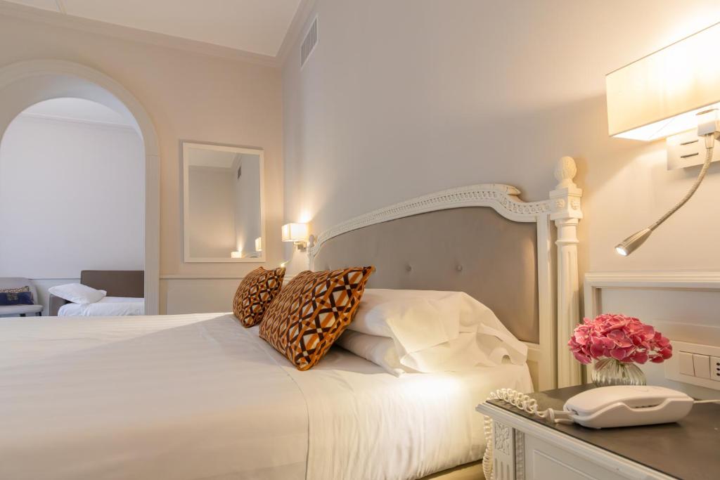 Letto o letti in una camera di Parco dei Principi Boutique Hotel