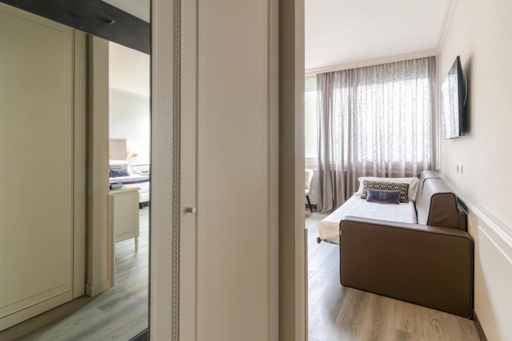 TV o dispositivi per l'intrattenimento presso Parco dei Principi Boutique Hotel