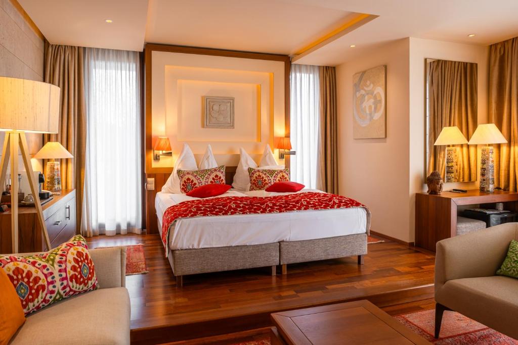 Łóżko lub łóżka w pokoju w obiekcie Mala Garden Design Hotel